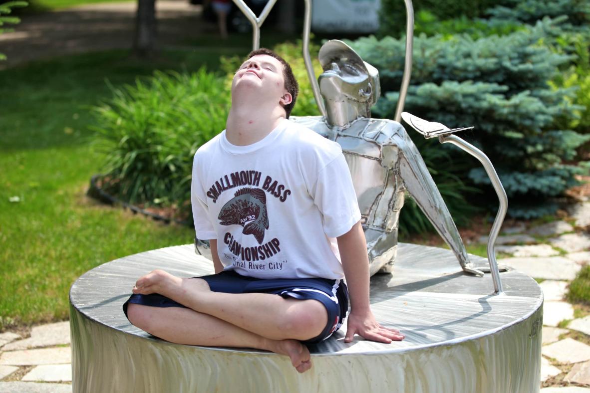 Camper imitating statue.