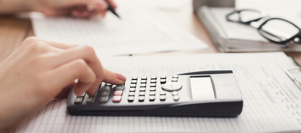 Woman on calculator