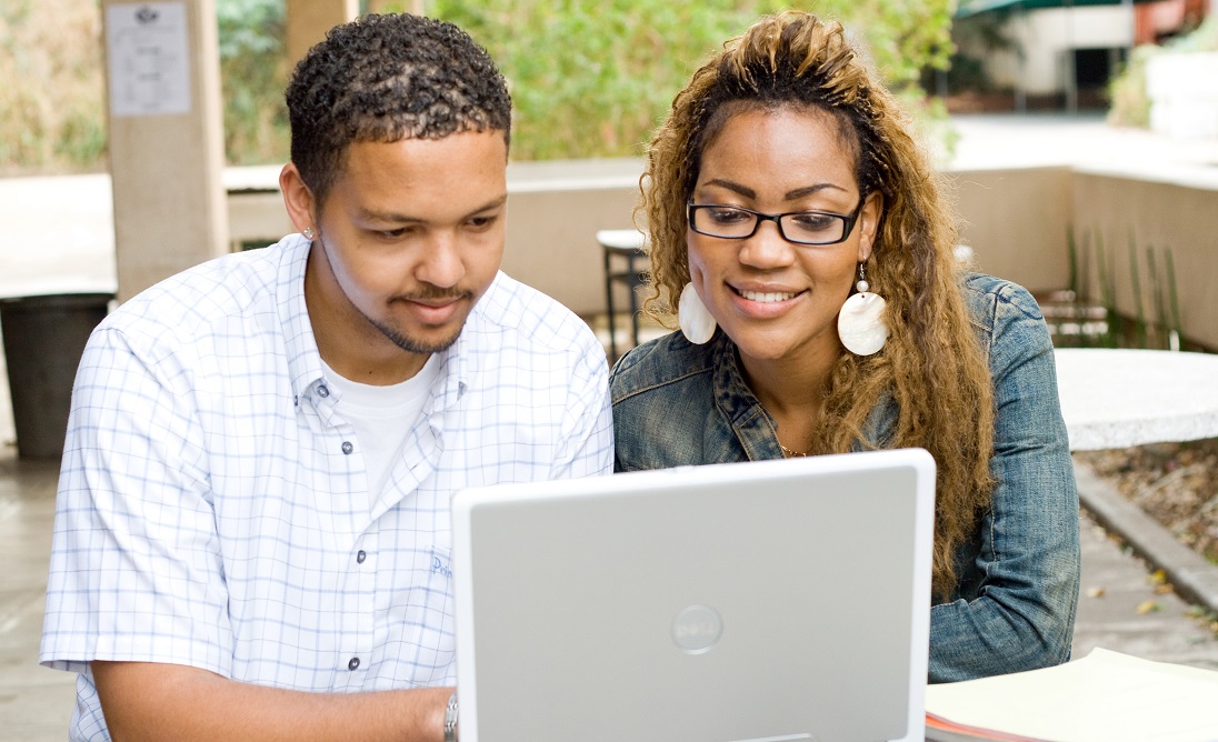 couple looking at computer