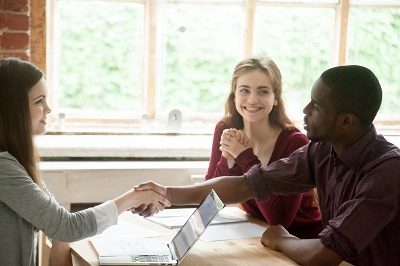 a man and woman receiving financial counseling