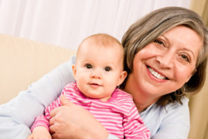 Grandma holding baby
