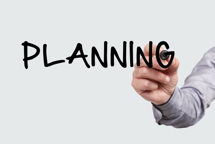The word Planning written on clear surface