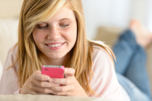 Teen with cellphone