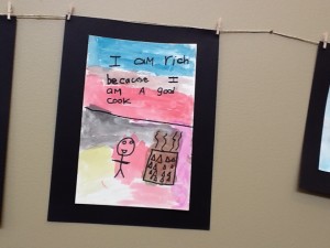 Child's art work framed and hung for exhibit