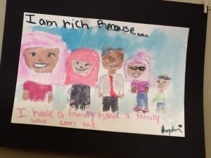 Child's art work framed and hung for exhibit