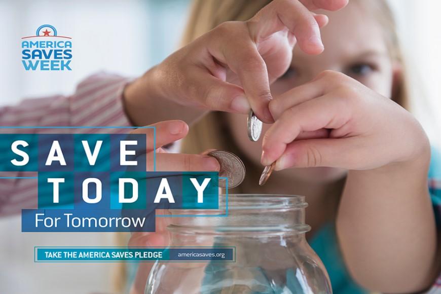 Children putting coins into savings jar