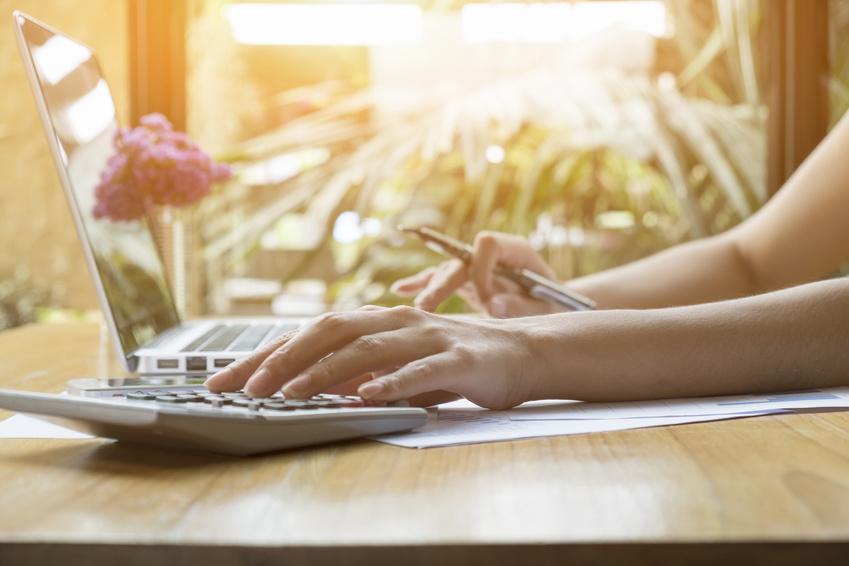 Woman using a calculator