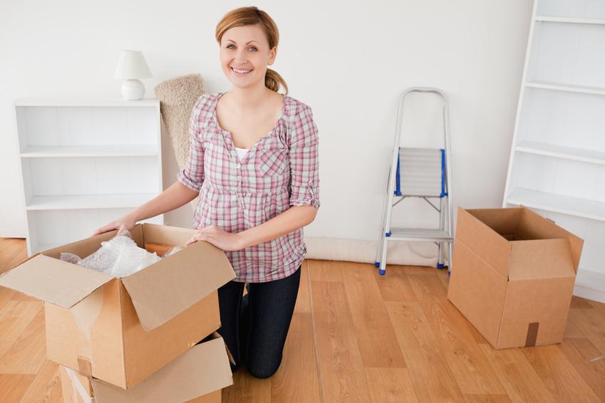 Woman unpacking boxes