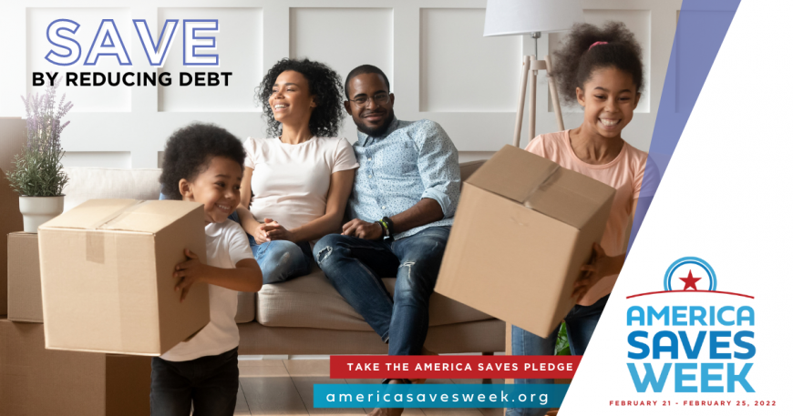 Happy African American family with young kids carrying boxes