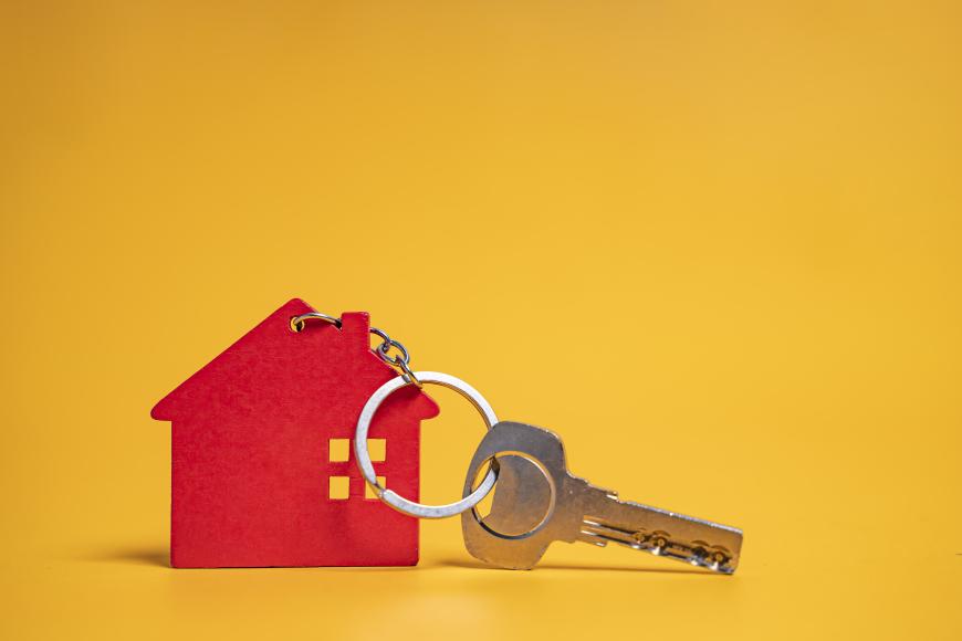 Key hooked to a house miniature