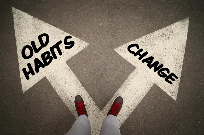 Two arrows pointing in different directions. One says "Old Habits," and the other says "Change."
