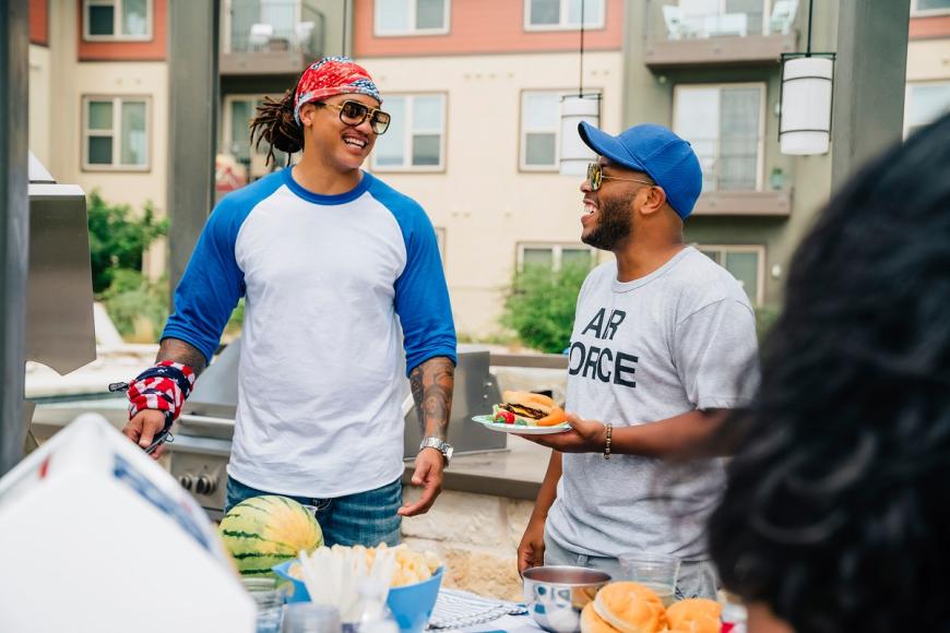 Two friends at a barbeque