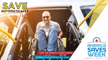 Smiling man in wheelchair exiting vehicle