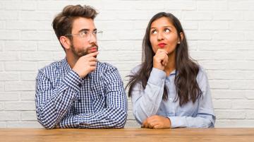 Mixed race couple pondering
