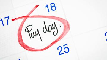 Pay day circled in red on calendar