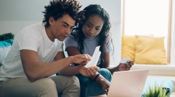 African American couple doing finances