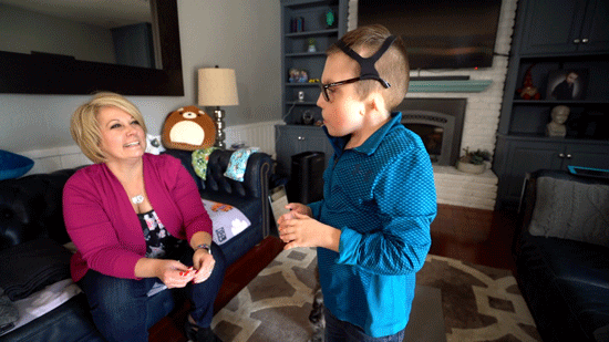 ​​Bently and his mom playing in the living room.
