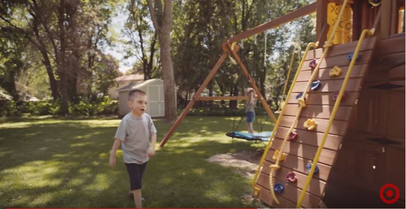 Bentley by his swing set
