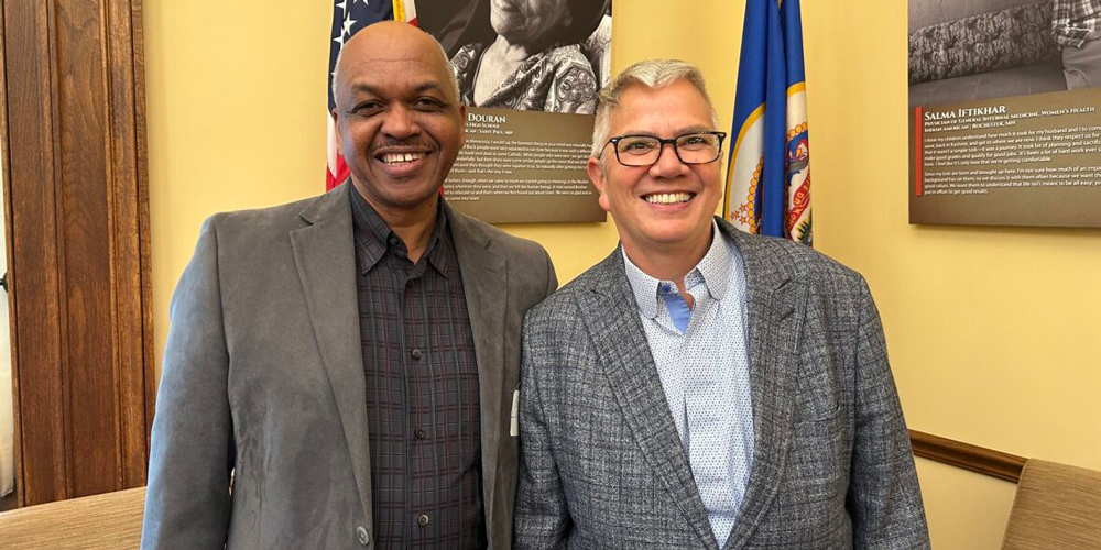 Paul Slack and commissioner Ho at the MN State Capital building