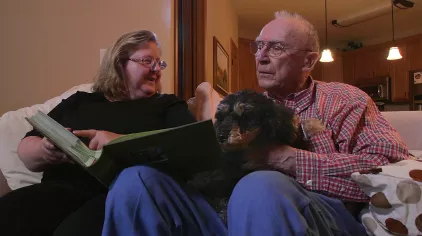 Caregiver visiting an older adult. 